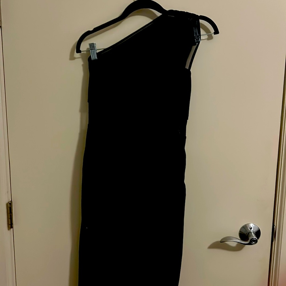 Express black one shoulder with  see through. Size small